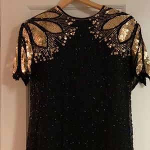 Black and gold sequin dress